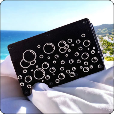 Slim metal wallet with laser-engraved bubble pattern for a unique, modern style