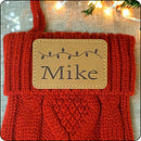 Personalized Christmas stocking with a festive Christmas lights design and engraved name patch