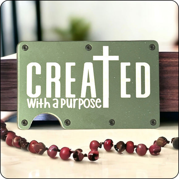 Engraved 'Created with a Purpose' inspirational faith quote on a minimalist wallet