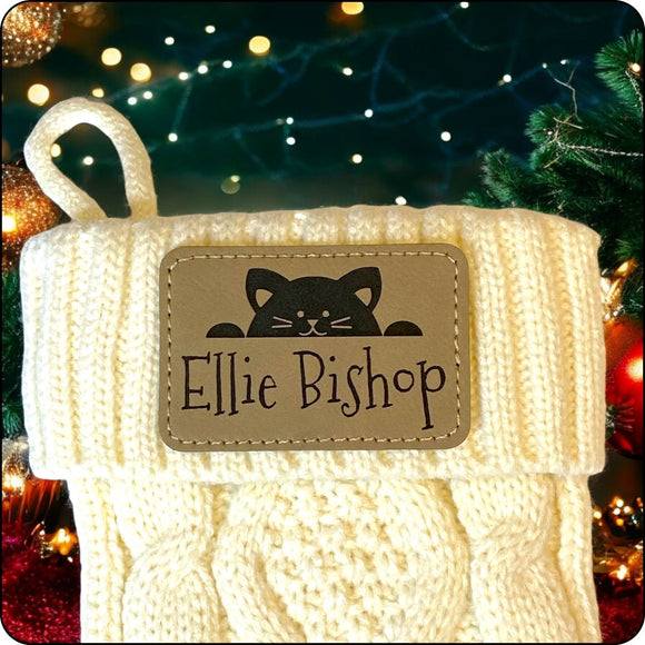 Custom cat-themed Christmas stocking with an engraved name patch, perfect for cat lovers