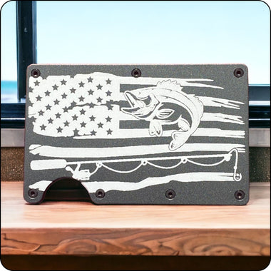 Slim metal wallet featuring an engraved American flag with a fishing theme