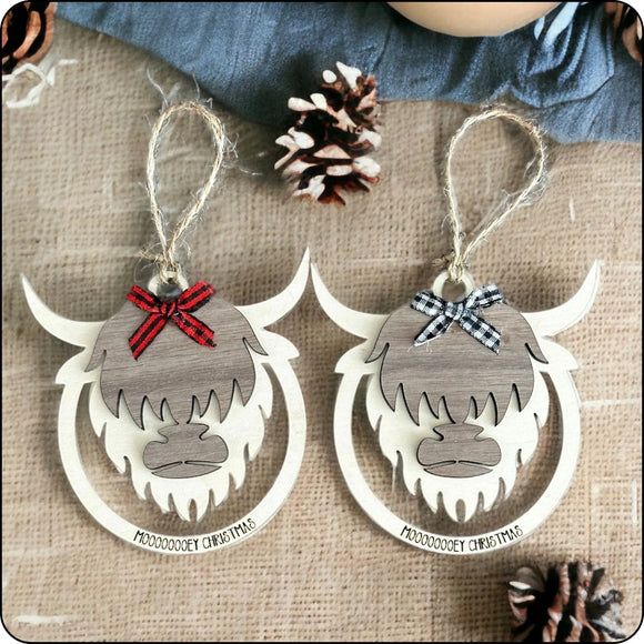 Handmade wooden Highland cow ornament with two-layer design for a 3D effect