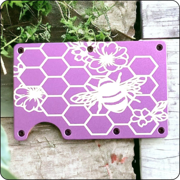Engraved honeybee design on a slim metal wallet, ideal for nature lovers and beekeepers