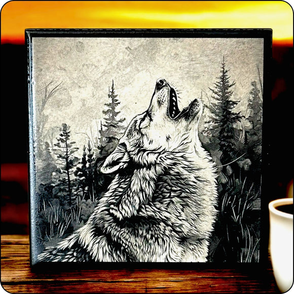 Howling wolf ceramic coaster displayed against a sunset backdrop, evoking a rustic and wild aesthetic