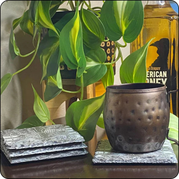 Military boots slate coaster in use with a copper mule mug, adding a rugged patriotic touch